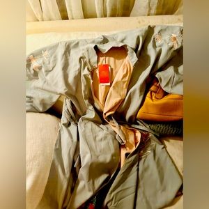 Beautiful satin embroidered jacket with wrap belt. Brand new still has tags